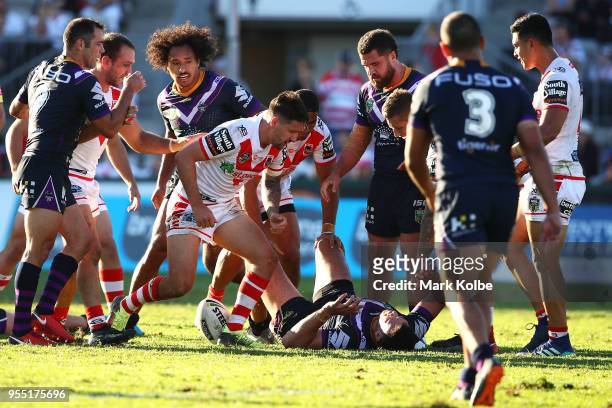 Gareth Widdop of the Dragons reacts after a high tackle from Nelson Asofa-Solomona of the Storm during the round nine NRL match between the St George...
