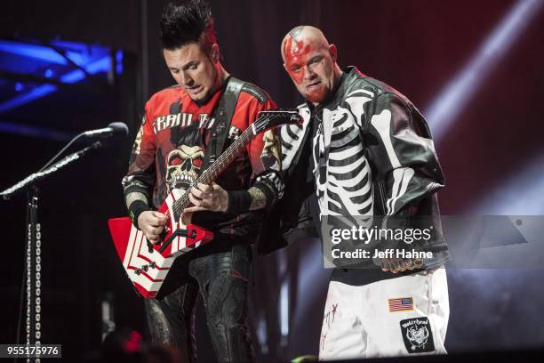 Guitarist Jason Hook and singer Ivan Moody of Five Finger Death Punch performs at Charlotte Motor Speedway on May 5, 2018 in Charlotte, North...