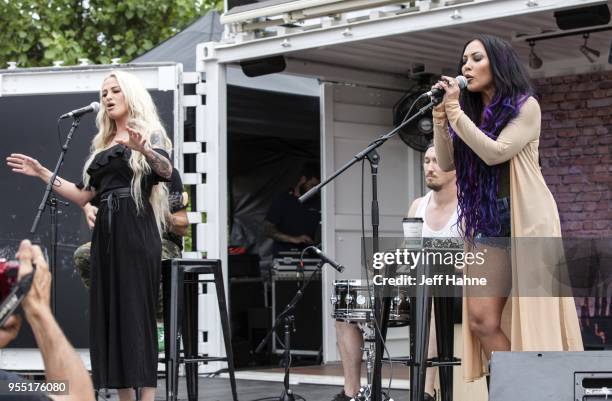 Singers Heidi Shepherd and Carla Harvey of Butcher Babies perform at the Zippo Sessions at Charlotte Motor Speedway on May 5, 2018 in Charlotte,...