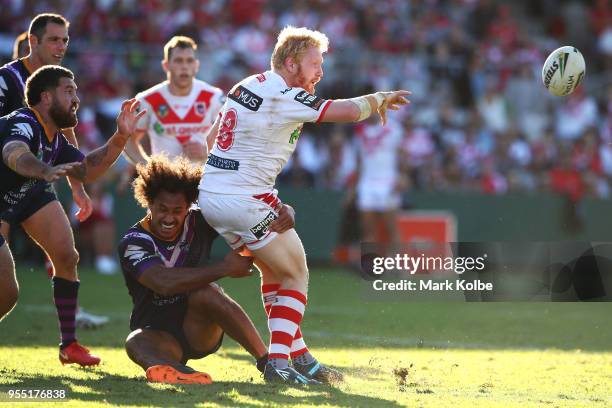 James Graham of the Dragons passes during the round nine NRL match between the St George Illawarra Dragons and the Melbourne Storm at UOW Jubilee...