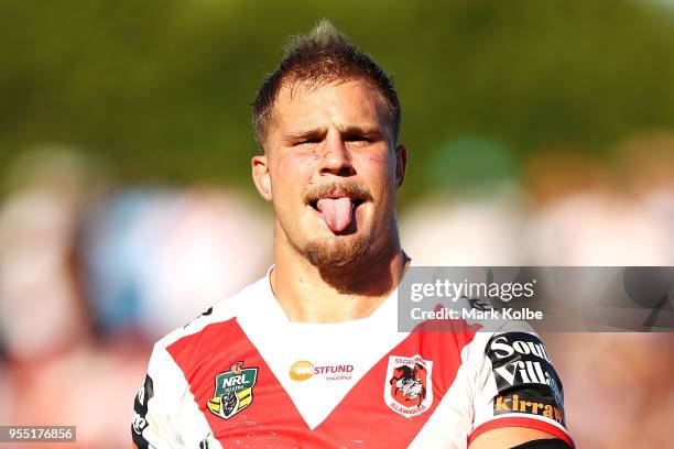 Jack De Belin of the Dragons pokes out his tongue as he leaves the field during the round nine NRL match between the St George Illawarra Dragons and...