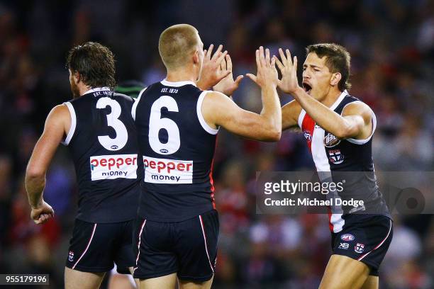 Ben Long of the Saints celebrates a goal with Sebastian Ross during the round seven AFL match between St Kilda Saints and the Melbourne Demons at...