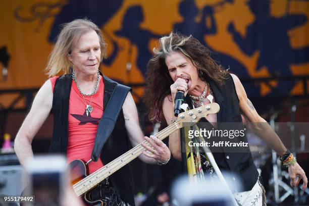 Tom Hamilton and Steven Tyler of Aerosmith perform onstage during Day 6 of the 2018 New Orleans Jazz & Heritage Festival at Fair Grounds Race Course...
