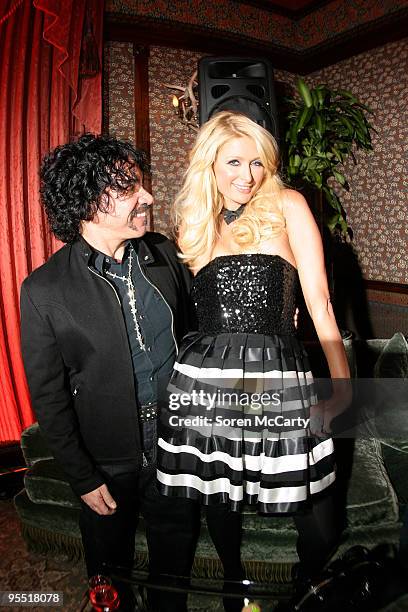 John Oates and Paris Hilton attend Niche Media's Aspen Peak Magazine & Microsoft Bing's NYE Bash hosted by Haley & Jason Binn and Aimee & John Oates...