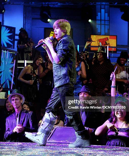 Singer Justin Bieber performs during Dick Clark's New Year's Rockin' Eve With Ryan Seacrest 2010 at Aria Resort & Casino at the City Center on...