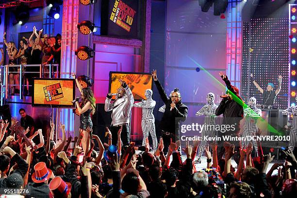 Recording artists Fergie, will.i.am, apl.de.ap and Taboo of the Black Eyed Peas perform onstage during Dick Clark's New Year's Rockin' Eve With Ryan...