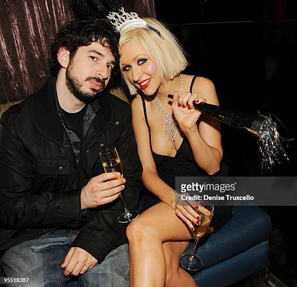 Jordan Bratman and Christina Aguilera celebrate New Year's Eve at TAO Nightclub at the Venetian on December 31, 2009 in Las Vegas, Nevada.