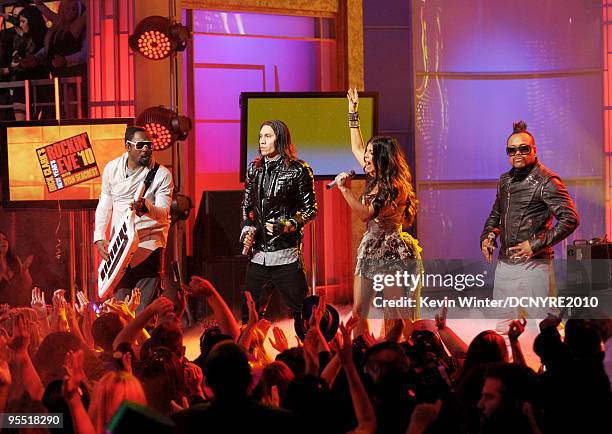 Recording artists will.i.am, Taboo, Fergie and apl.de.ap of the Black Eyed Peas perform onstage during Dick Clark's New Year's Rockin' Eve With Ryan...