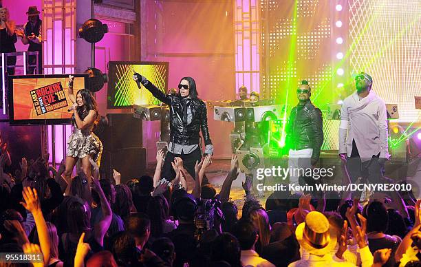 Recording artists Fergie, Taboo, apl.de.ap and will.i.am of the Black Eyed Peas perform onstage during Dick Clark's New Year's Rockin' Eve With Ryan...