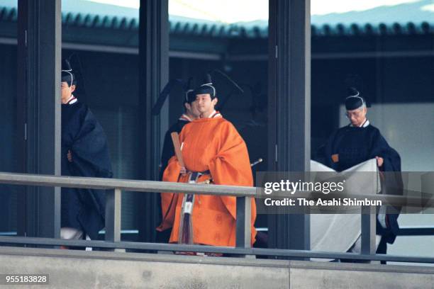 Crown Prince Naruhito walks a corridor to attend the 'Seiden-no-Gi' during the 'Sokui-no-Rei', Emperor's Enthronement Ceremony at the Imperial Palace...