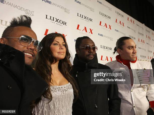 Apl.De.Ap, Fergie, Will.I.Am and Taboo of The Black Eyed Peas attend New Year's Eve at LAX Nightclub on December 31, 2009 in Las Vegas, Nevada.