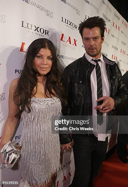 Fergie of the Black Eyed Peas and actor Josh Duhamel attend New Year's Eve at LAX Nightclub on December 31, 2009 in Las Vegas, Nevada.