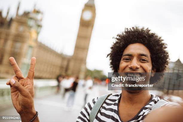 tourist in london take a selfie - big ben selfie stock pictures, royalty-free photos & images