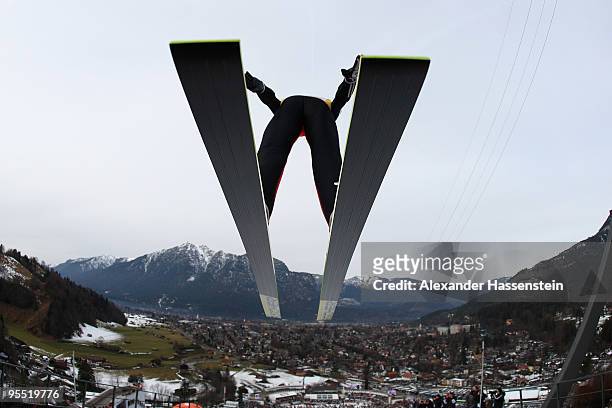 Andreas Kofler of Austria competes during trail round of the FIS Ski Jumping World Cup event of the 58th Four Hills ski jumping tournament at the...