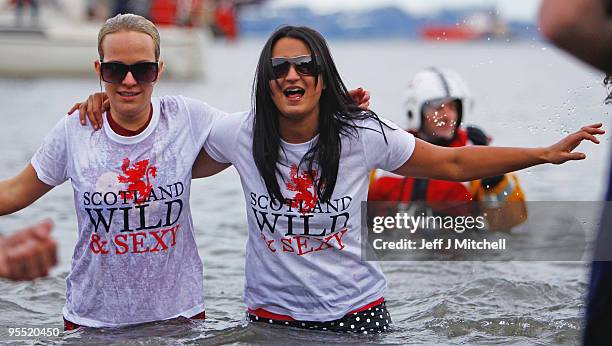 New Year revellers many in fancy dress, braved freezing conditions in the River Forth in front of the Forth Rail Bridge during the Loony Dook Swim on...