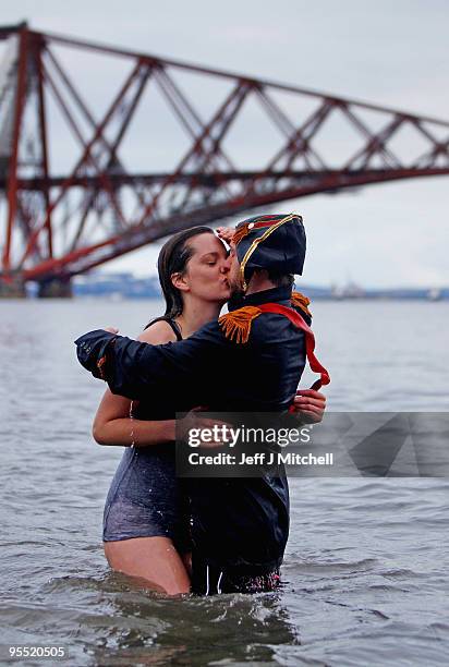 New Year revellers many in fancy dress, braved freezing conditions in the River Forth in front of the Forth Rail Bridge during the Loony Dook Swim on...