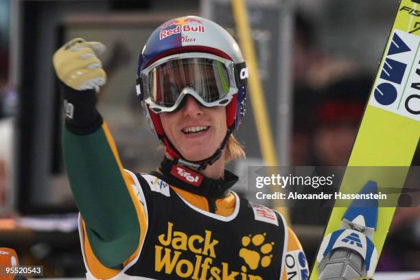 Gregor Schlierenzauer of Austria celebrates winning the FIS Ski Jumping World Cup event of the 58th Four Hills ski jumping tournament at the...