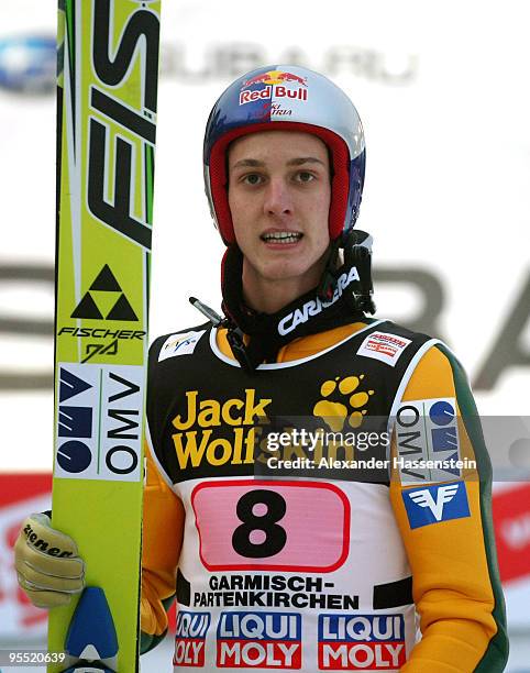 Gregor Schlierenzauer of Austria smiles after winning the FIS Ski Jumping World Cup event of the 58th Four Hills ski jumping tournament at the...