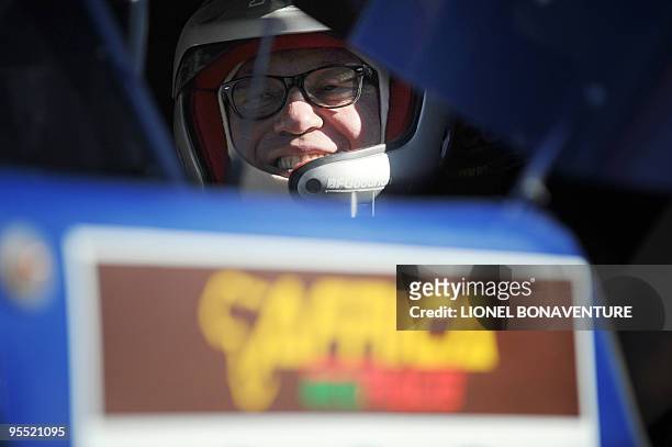 French driver Jean Louis Schlesser smiles on the finish line the third stage between La Momie and Mrhimina of the second edition of the Africa Race,...