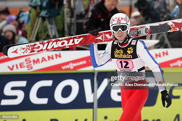 Bjoern Einar Romoeren of Norway looks on during the FIS Ski Jumping World Cup event of the 58th Four Hills Ski Jumping tournament at the...