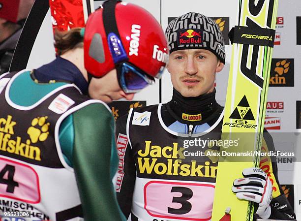 Janne Ahonen of Finland and Adam Malysz of Poland are pictured during the FIS Ski Jumping World Cup event of the 58th Four Hills Ski Jumping...