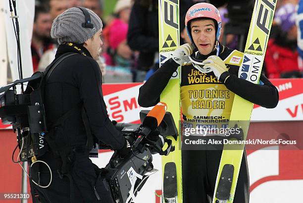 Andreas Kofler of Austria reacts after the final jump during the FIS Ski Jumping World Cup event of the 58th Four Hills Ski Jumping tournament at the...