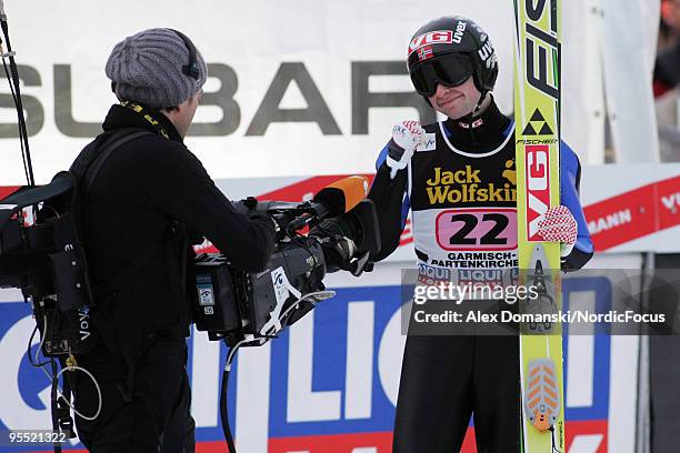 Anders Jacobsen of Norway reacts after the final jump during the FIS Ski Jumping World Cup event of the 58th Four Hills Ski Jumping tournament at the...