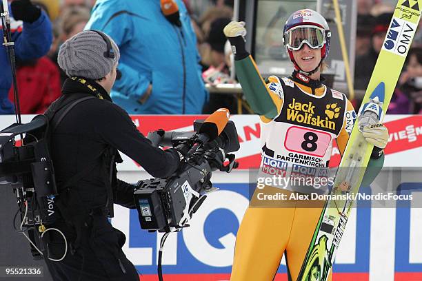 Gregor Schlierenzauer of Austria celebrates after winning the FIS Ski Jumping World Cup event of the 58th Four Hills Ski Jumping tournament at the...