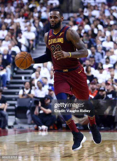 LeBron James of the Cleveland Cavaliers dribbles the ball in the second half of Game Two of the Eastern Conference Semifinals against the Toronto...