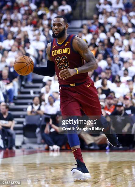 LeBron James of the Cleveland Cavaliers dribbles the ball in the second half of Game Two of the Eastern Conference Semifinals against the Toronto...