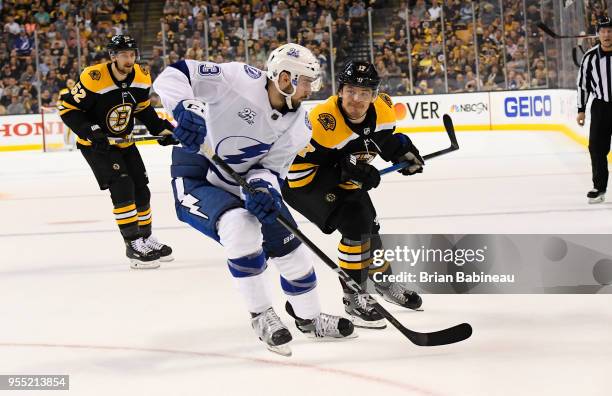 Ryan Donato of the Boston Bruins fights for position against the Tampa Bay Lightning in Game Four of the Eastern Conference Second Round during the...