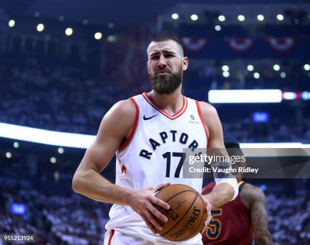 Jonas Valanciunas of the Toronto Raptors reacts after fouling J.R. Smith of the Cleveland Cavaliers in the first half of Game Two of the Eastern...