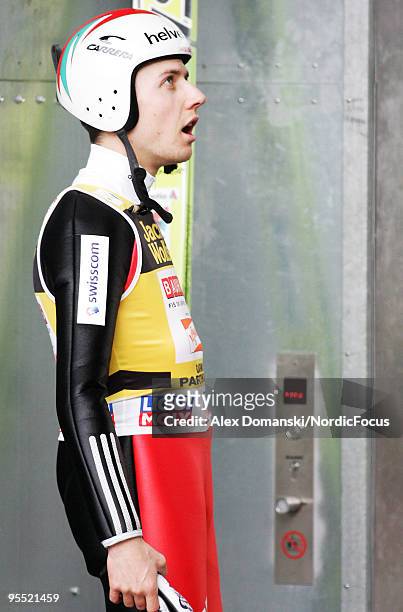 Simon Ammann of Switzerland looks on during the FIS Ski Jumping World Cup event of the 58th Four Hills Ski Jumping tournament at the Olympiaschanze...
