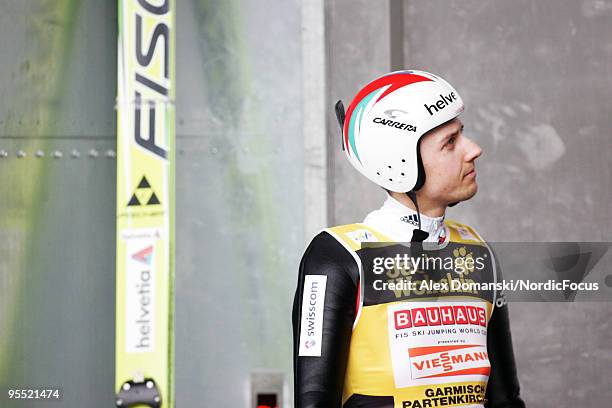 Simon Ammann of Switzerland looks on during the FIS Ski Jumping World Cup event of the 58th Four Hills Ski Jumping tournament at the Olympiaschanze...