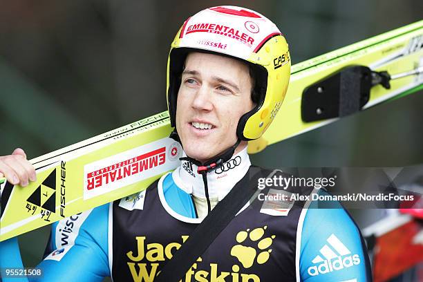 Andreas Kuettel of Switzerland looks on during the FIS Ski Jumping World Cup event of the 58th Four Hills Ski Jumping tournament at the...