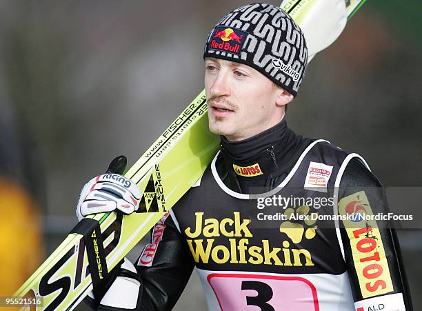 Adam Malysz of Poland looks on during the FIS Ski Jumping World Cup event of the 58th Four Hills Ski Jumping tournament at the Olympiaschanze on...