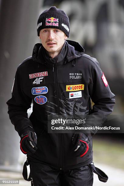 Adam Malysz of Poland looks on during the FIS Ski Jumping World Cup event of the 58th Four Hills Ski Jumping tournament at the Olympiaschanze on...