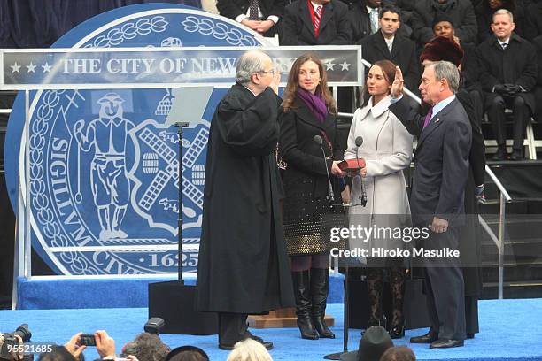 New York Mayor Michael Bloomberg takes the oath of office administered by New York State Chief Judge Jonathan Lippman as his daughters Emma Bloomberg...