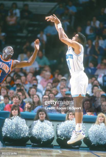 Dell Curry of the Charlotte Hornets shoots against the Detroit Pistons during an NBA basketball game circa 1993 at the Charlotte Coliseum in...