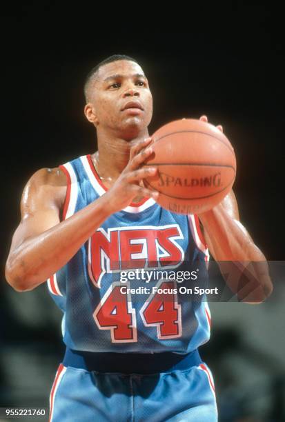 Derrick Coleman of the New Jersey Nets shoots a free throw against the Washington Bullets during an NBA basketball game circa 1991 at The Capital...