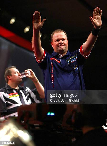 Raymond Van Barneveld of Netherlands celebrates after beating Ronnie Baxter of England during the Quarter Finals of the 2010 Ladbrokes.com World...