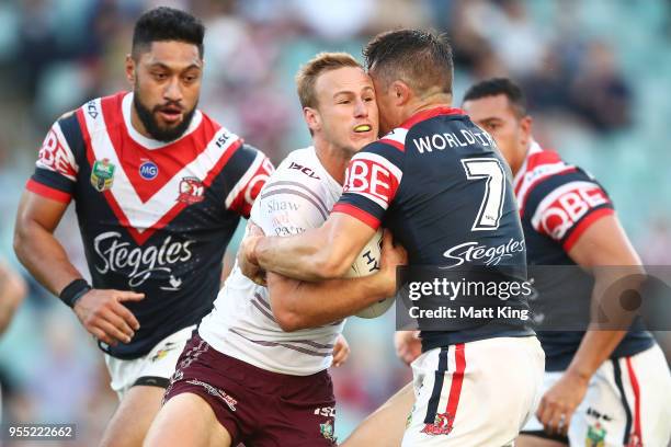 Daly Cherry-Evans of the Sea Eagles is tackled during the round nine NRL match between the Sydney Roosters and the Manly Warringah Sea Eagles at...