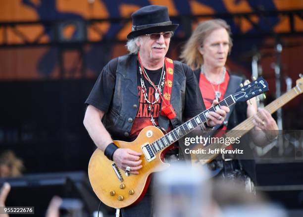 Brad Whitford and Tom Hamilton of Aerosmith perform onstage during Day 6 of the 2018 New Orleans Jazz & Heritage Festival at Fair Grounds Race Course...