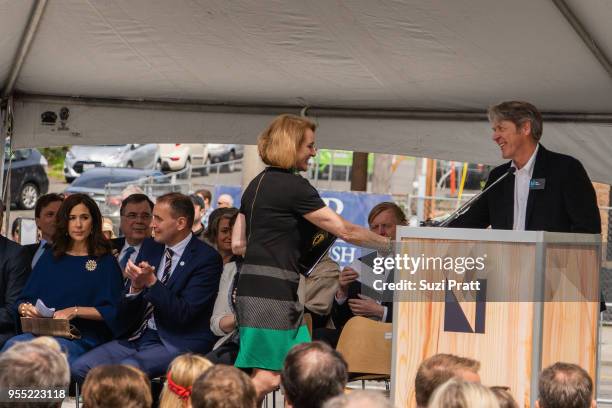 Her Royal Highness, the Crown Princess Mary of Denmark and President of Iceland Gudni Th. Johannesson applaud as Seattle Mayor Jenny Durkan shakes...