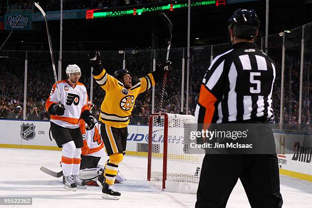 Marco Sturm of the Boston Bruins celebrates scoring a goal to defeat the Philadelphia Flyers 2-1 in overtime during the 2010 Bridgestone Winter...