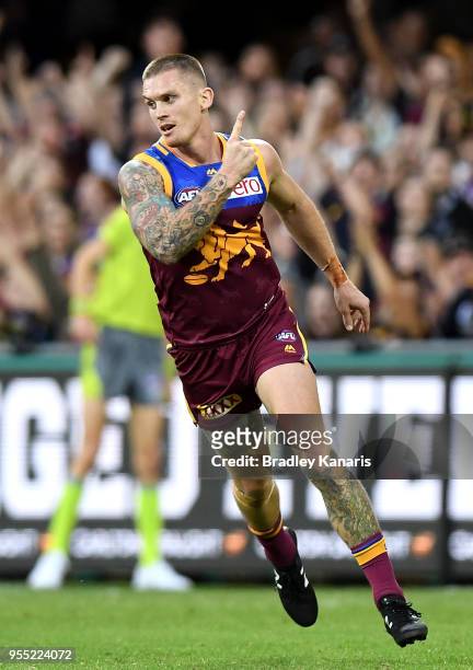 Dayne Beams of the Lions celebrates scoring a goal during the round seven AFL match between the Brisbane Lions and the Collingwood Magpies at The...