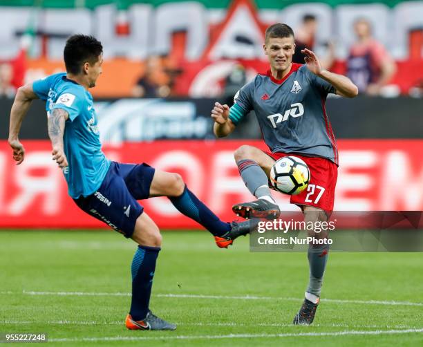 Matias Kranevitter of FC Zenit Saint Petersburg and Igor Denisov of FC Lokomotiv Moscow during the Russian Football League match between FC Lokomotiv...