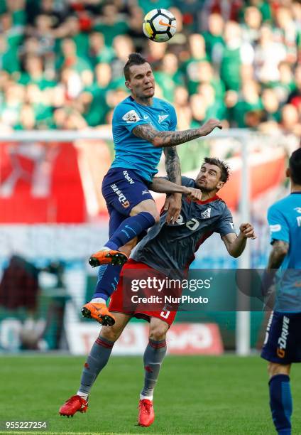 Anton Zabolotny of FC Zenit Saint Petersburg and Nemanja Pejcinovic of FC Lokomotiv Moscow during the Russian Football League match between FC...