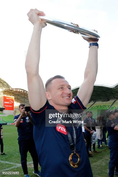 Besart Berisha of the Victory holds up the trophy during a fan gathering AAMI Park on May 6, 2018 in Melbourne, Australia. Melbourne Victory defeated...