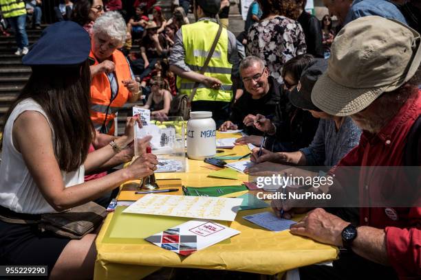 Hundreds take part in &quot;The party for Macron&quot; rally called to protest against policies of the French president on the first anniversary of...